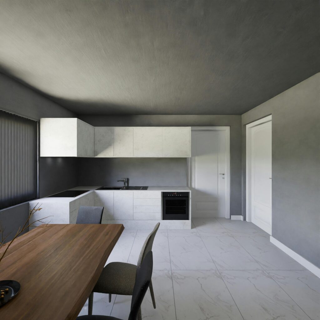 Cocina moderna reformada en una vivienda de Oviedo con acabados elegantes y diseño funcional